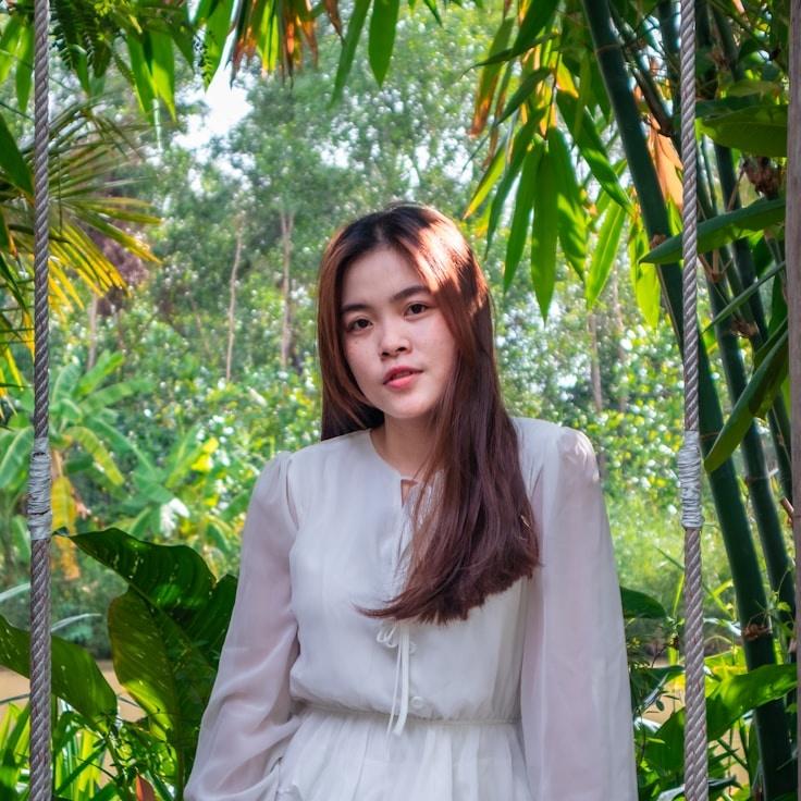 Asha Rao, Lead Design Curator at SimpleCabinView, reviewing corporate floral arrangements